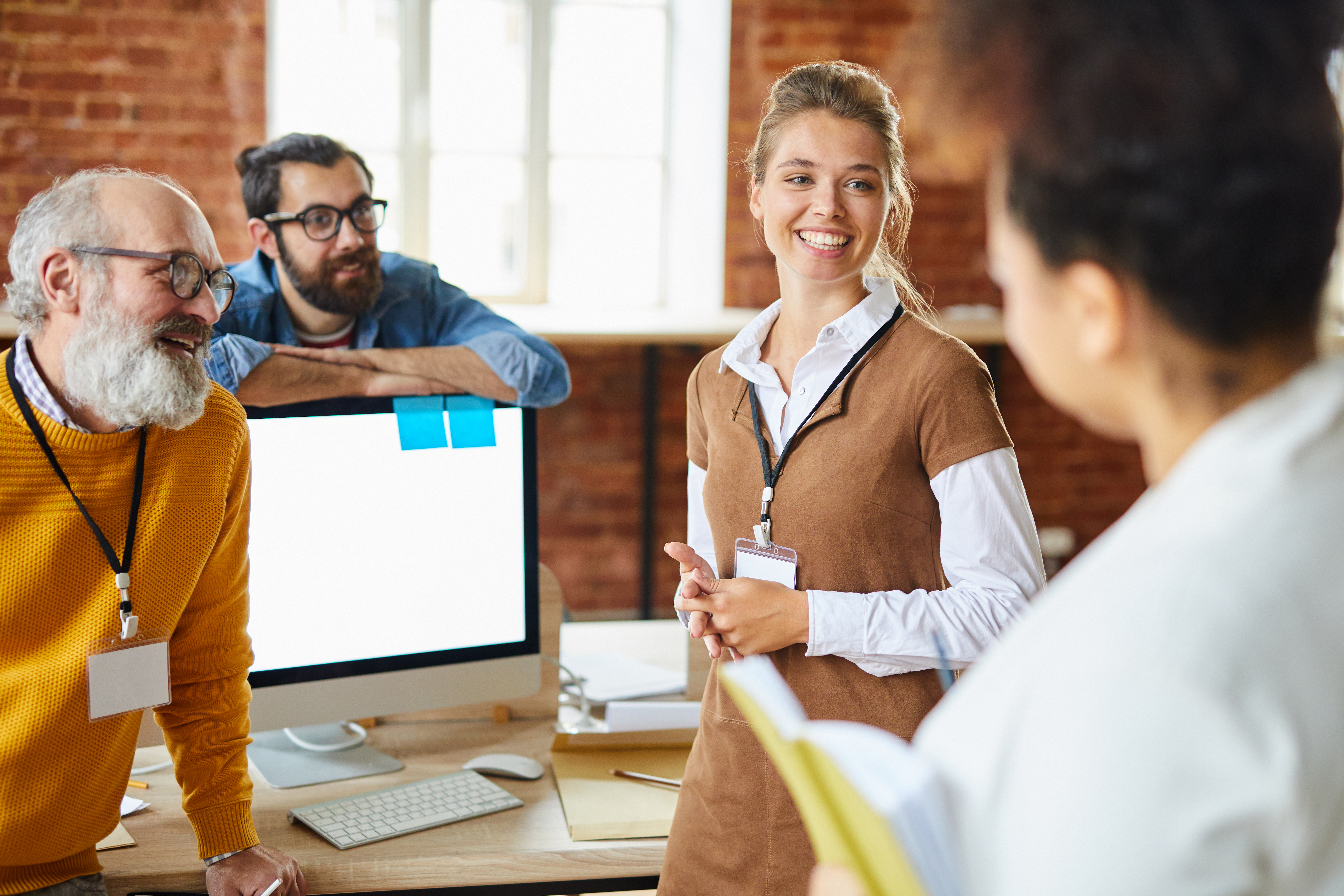 Team conversating in office