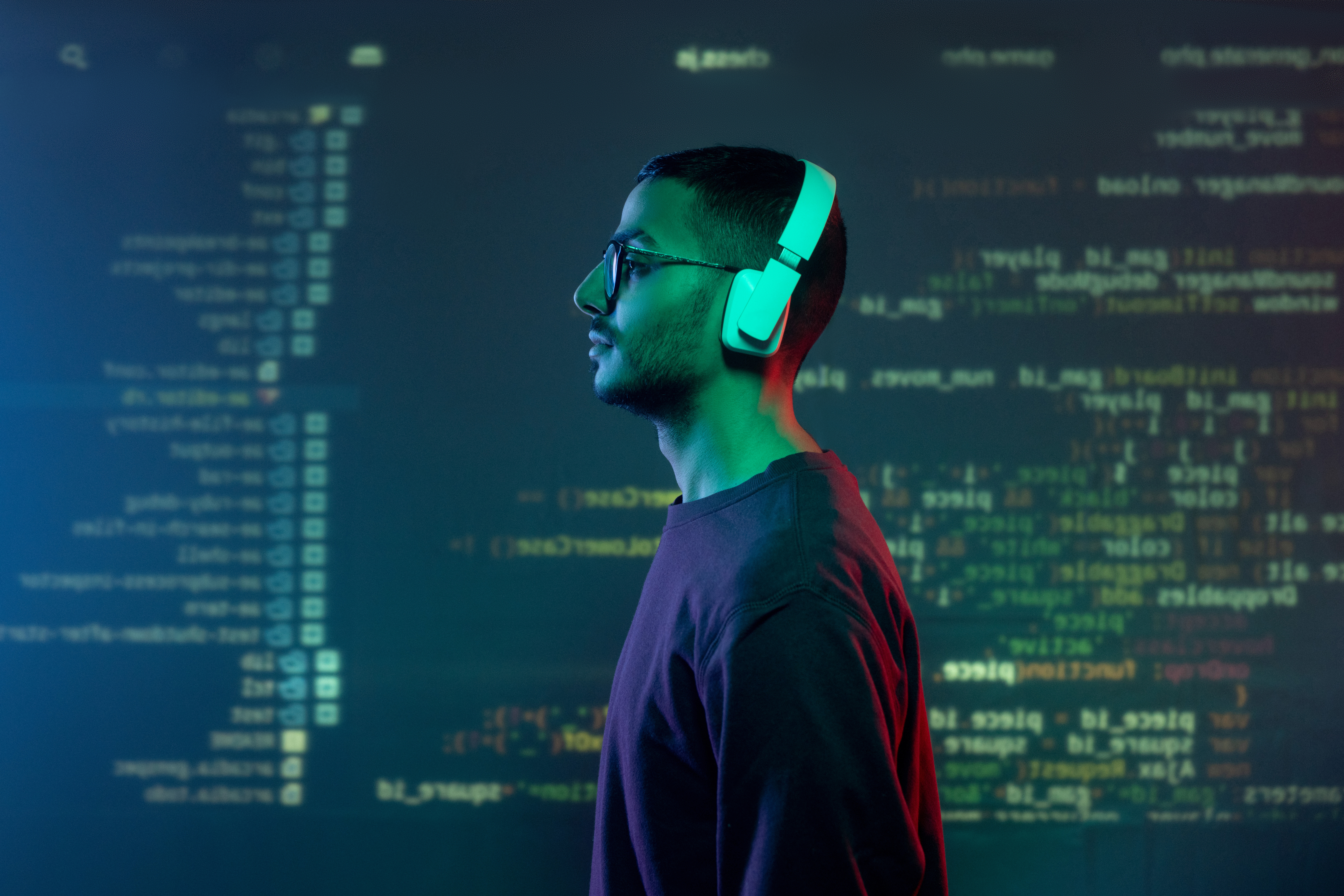 Programmer wearing headphones
